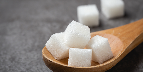 white-sugar-cube-wood-spoon-table 1